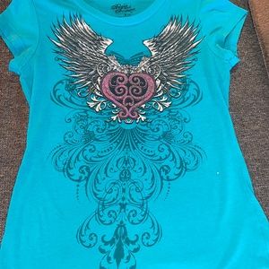 I really love this shirt medium has been worn but has been washed already